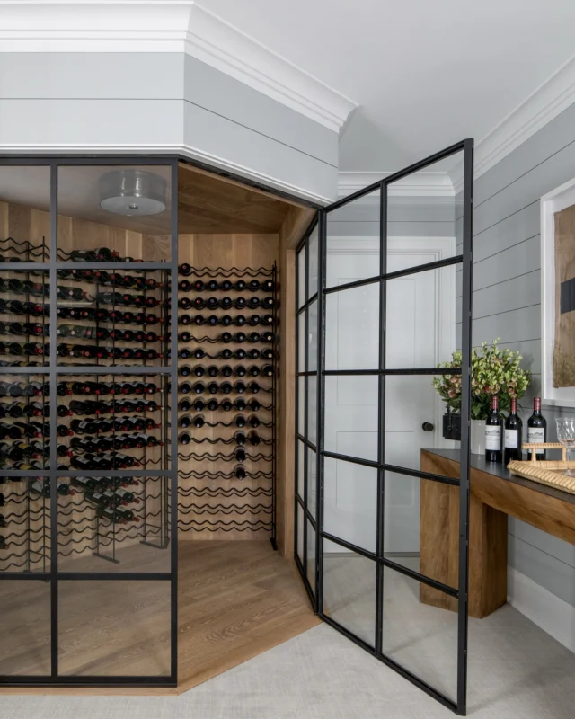 Transforming spaces, one bottle at a time! 🍷 We’re excited to share this custom wine cellar we designed, blending elegance and functionality for the ultimate wine lover’s sanctuary. From temperature-controlled storage to custom racking and stunning finishes, every detail was tailored to elevate the client’s experience. Cheers to the perfect blend of design and craftsmanship! #WineCellarDesign #CustomInteriors #LuxuryLiving #WineLovers #HomeDesign #InteriorInspiration
.
.
Collaborating with our clients to create beautifully curated spaces is what we do best and we’re proud to say that we’re ridiculously great at it! Did you know that you don’t have to embark on a full-scale reno or new build, or buy everything brand spanking new to take advantage of our design services? If you’re looking to refresh a single room or a group of rooms, we’ve got you covered there too! Want to talk with Erika about your next project? Head on over to our website (link in profile) and complete our Design Questionnaire. Once we receive it, she will be in touch to schedule a complimentary 20-minute discovery call. ✨
.
.
Project : Hardwick Cottage on the Sound
Design + Details : @swankbydesign 
Architect : @petercadouxarchitects 
Lens : @raquellangworthy.photo 
Builder: @gatewaydevelopmentct